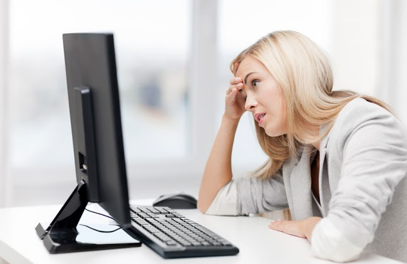 Woman looking at a computer screen