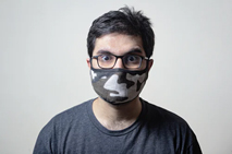 Man wearing a mask and glasses